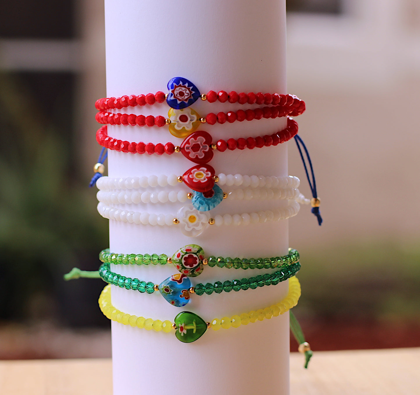 Three strand bracelets with murano heart divider