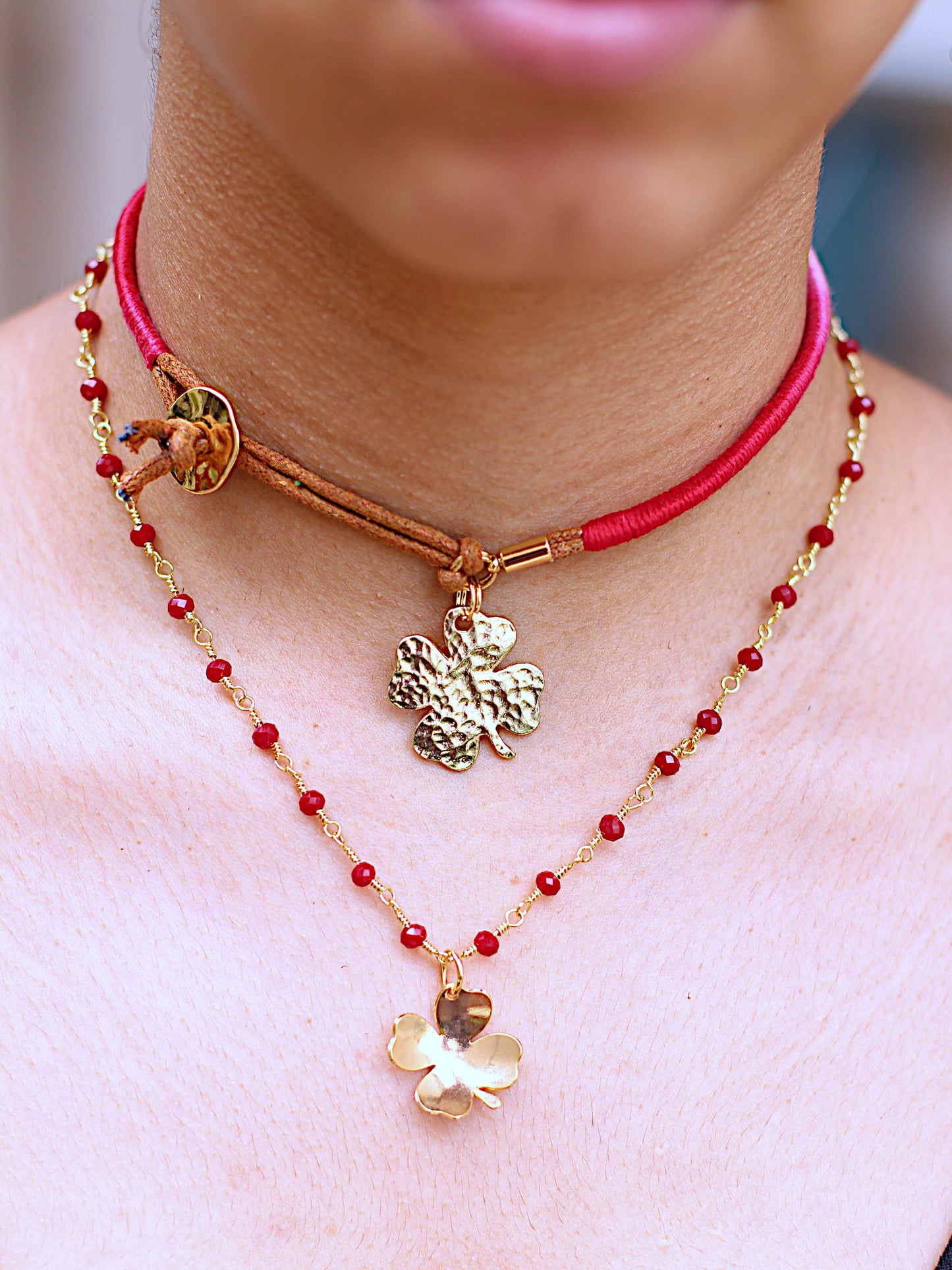 Red glass bead with clover