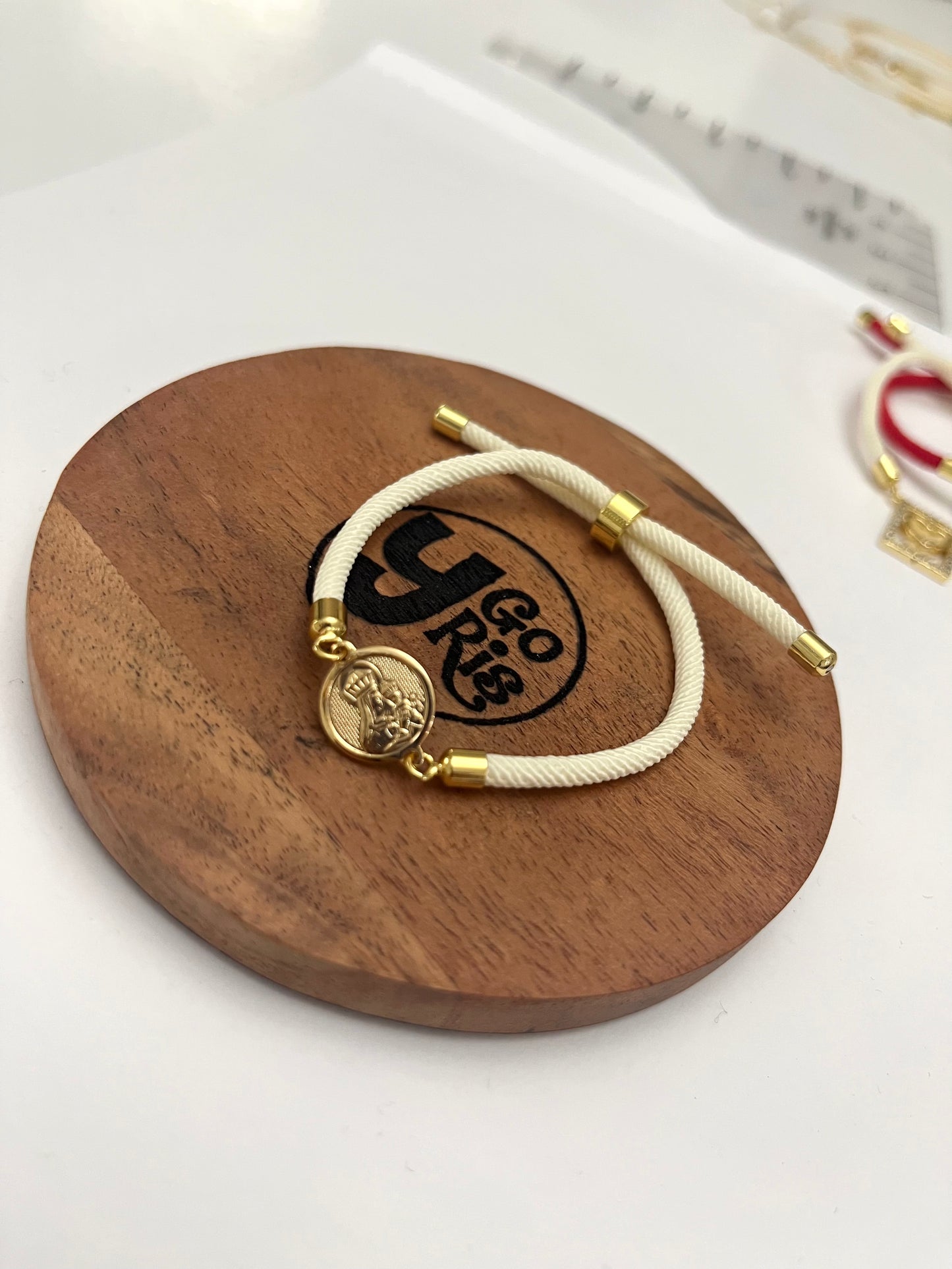 White adjustable bracelet with Virgen of Del Carmen