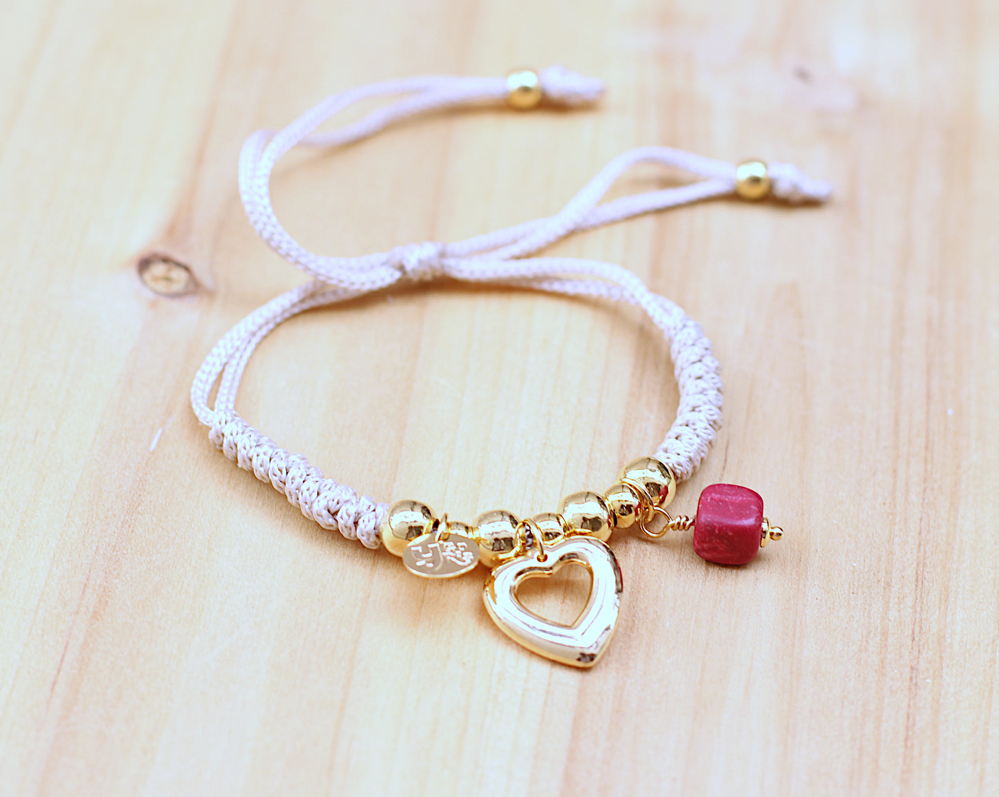 Cream-colored woven cord bracelet