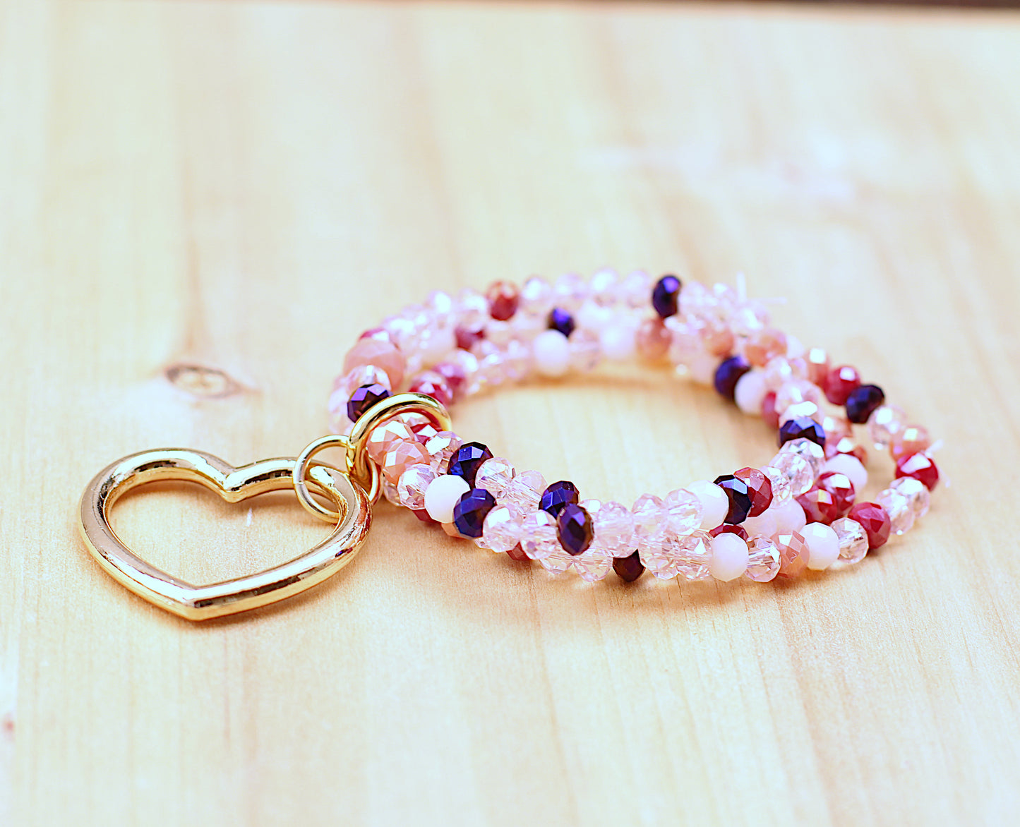 Three-strand elastic bracelet with heart