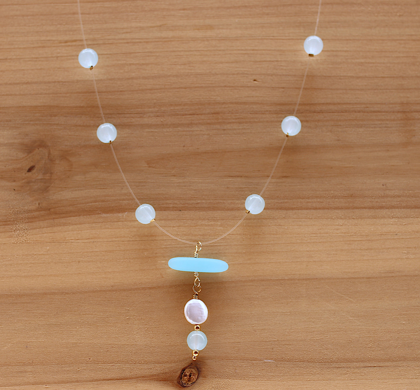 Glass beads on a Clear Cord.