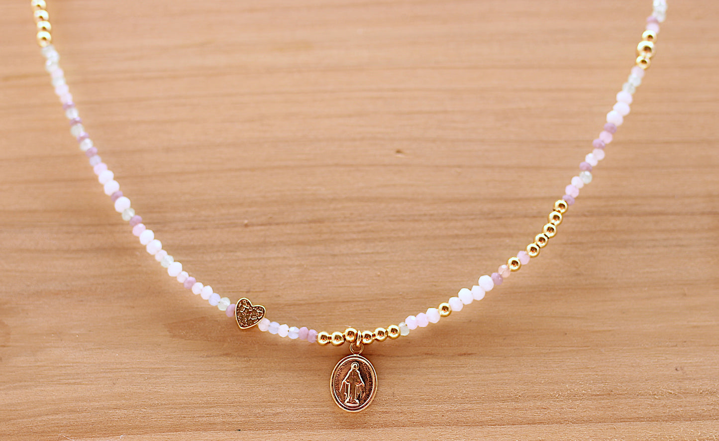 Light multicolor necklace with a La Milagrosa