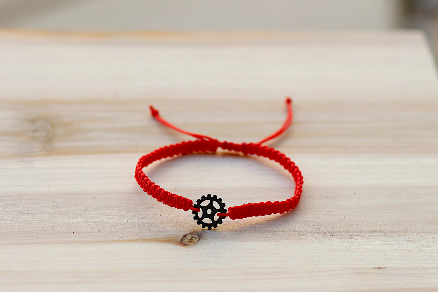Adjustable red bracelet for men
