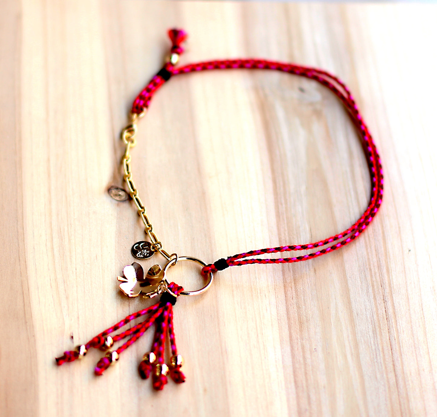 Red braided cord with chain