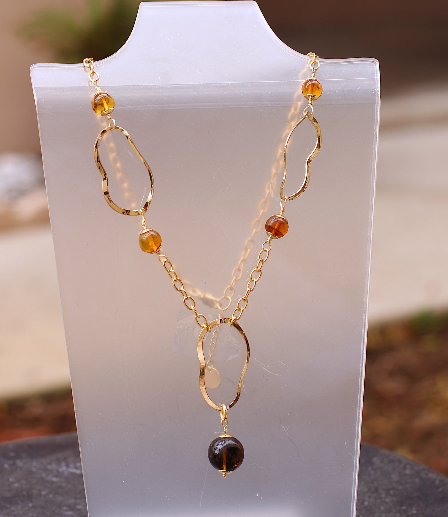 Oval shapes, Amber and chain necklace