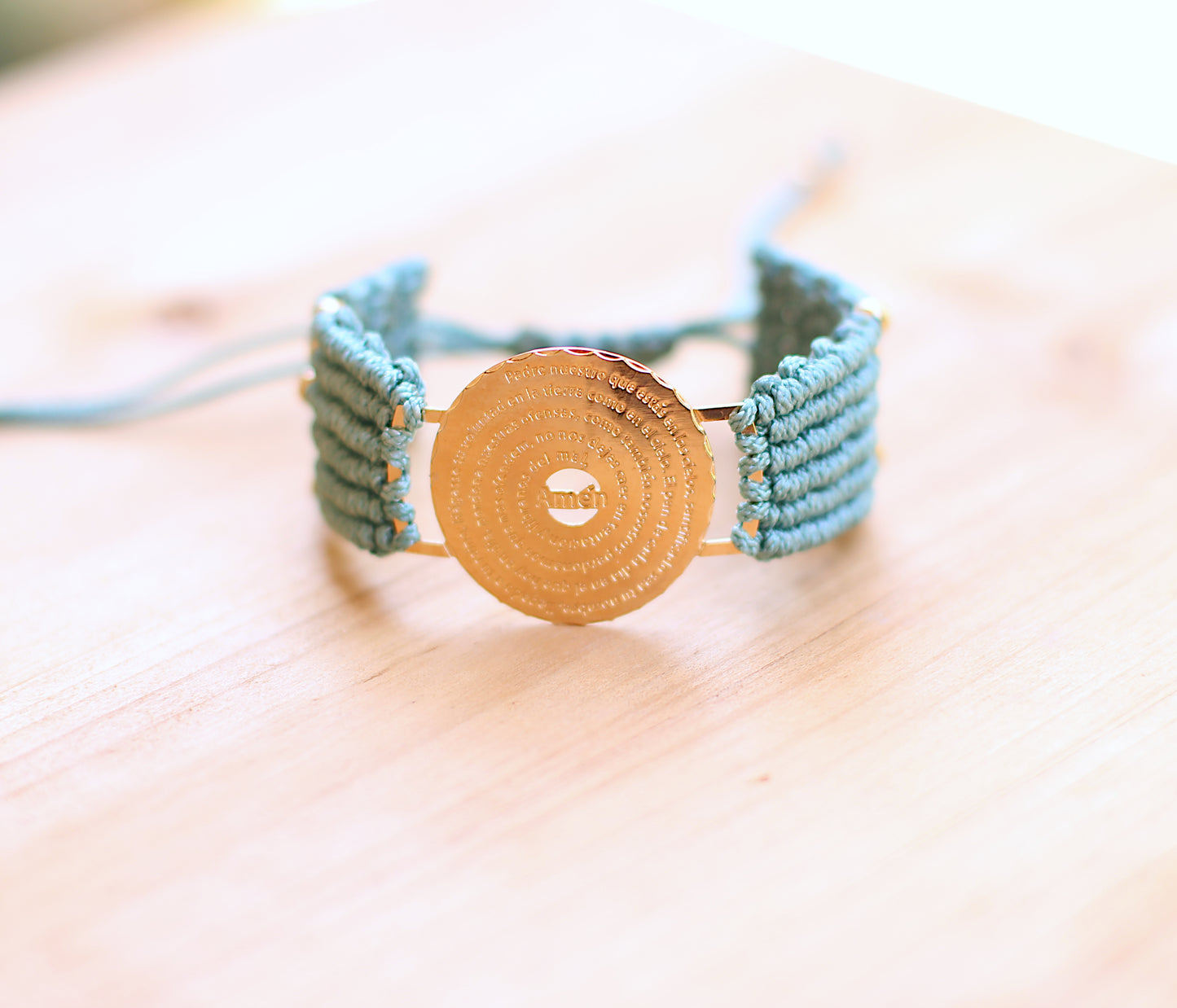 Padre Nuestro Divider with blue bracelet