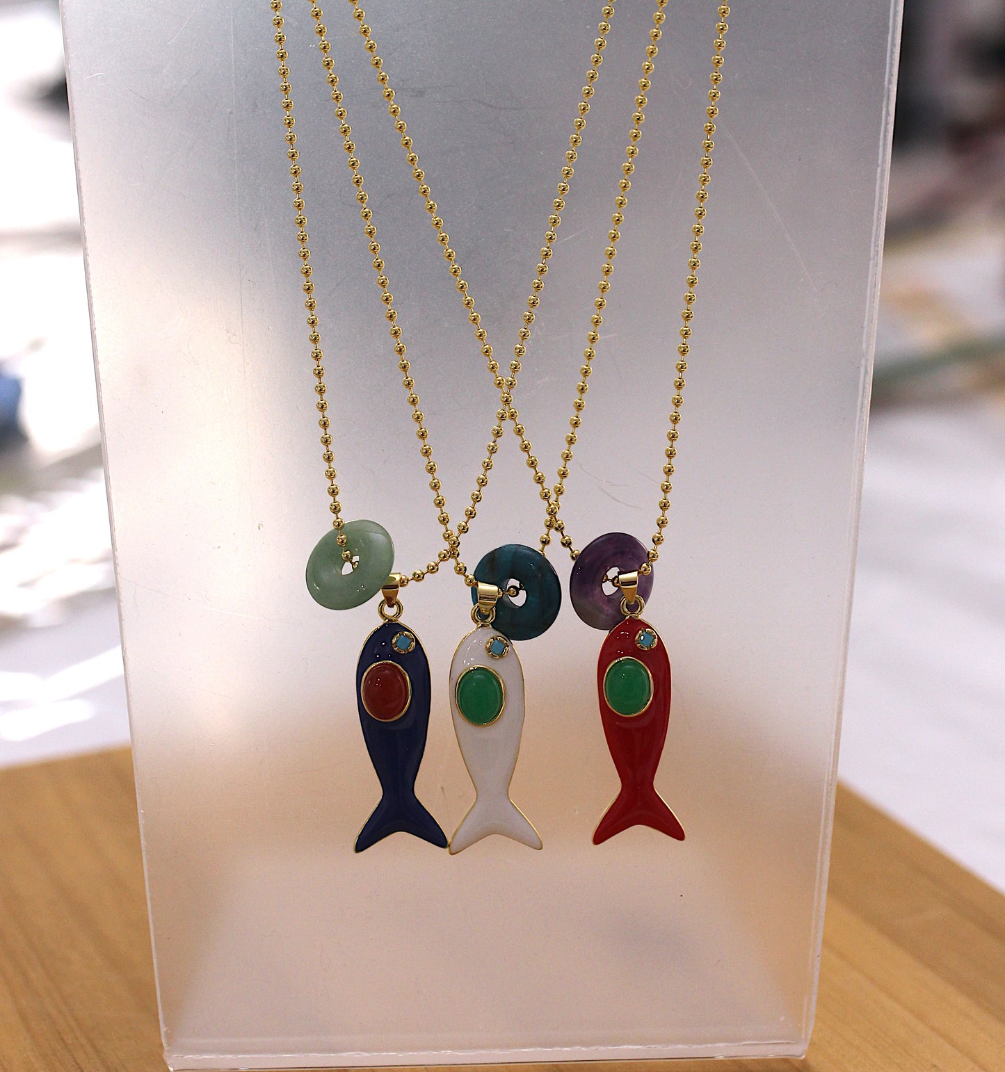 Ball chain necklace with red fish and amethyst