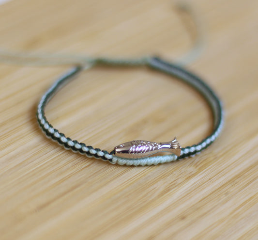Green and blue bracelet with a silver plated fish