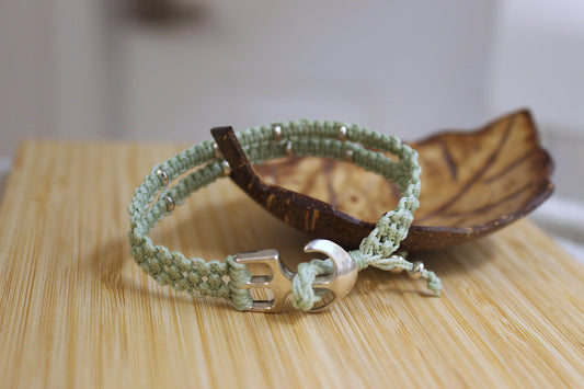 Green bracelet with anchor clasp