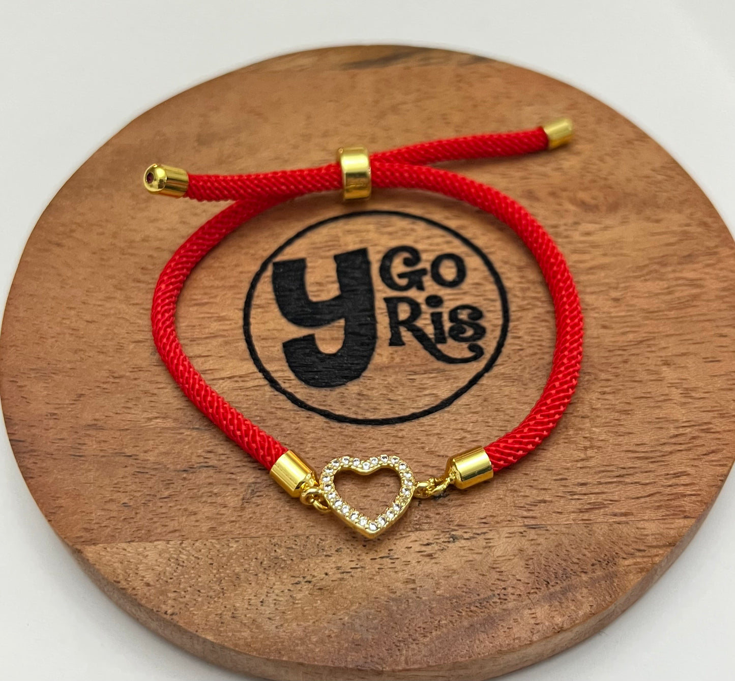 Adjustable red bracelet heart connector