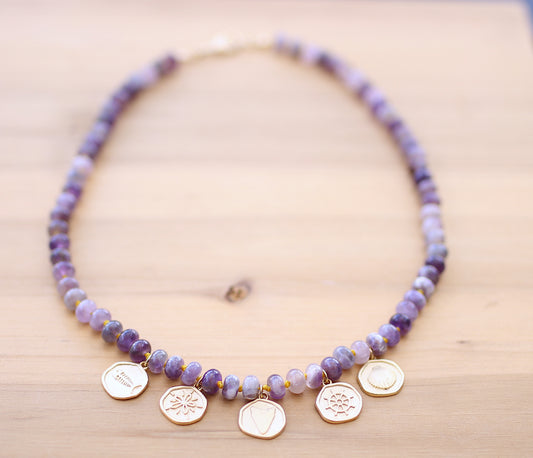 Purple necklace with sea motif round metals