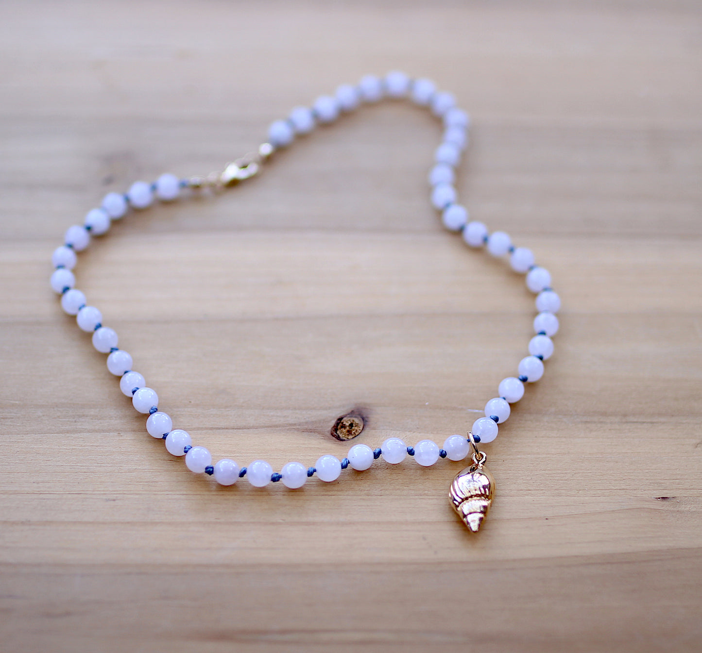White little beads with a sea shell necklace