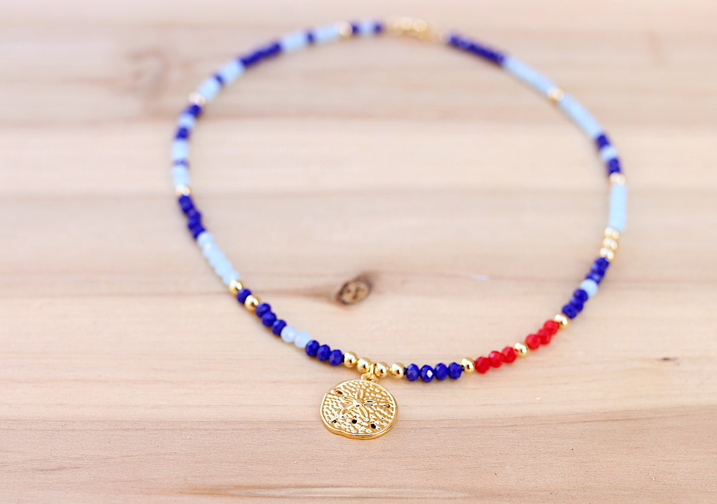 Shades of blues and red accent glass bead necklace