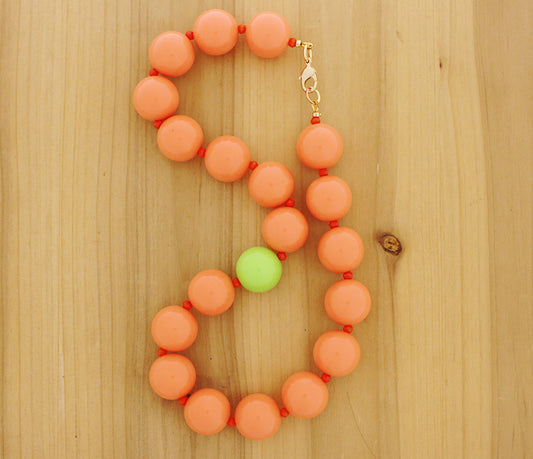 Orange bubble gum necklace