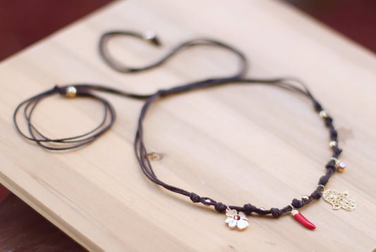 Brown necklace with charms