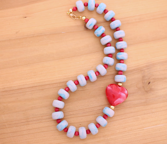 Blue marbleized donut shape beads with red heart necklace