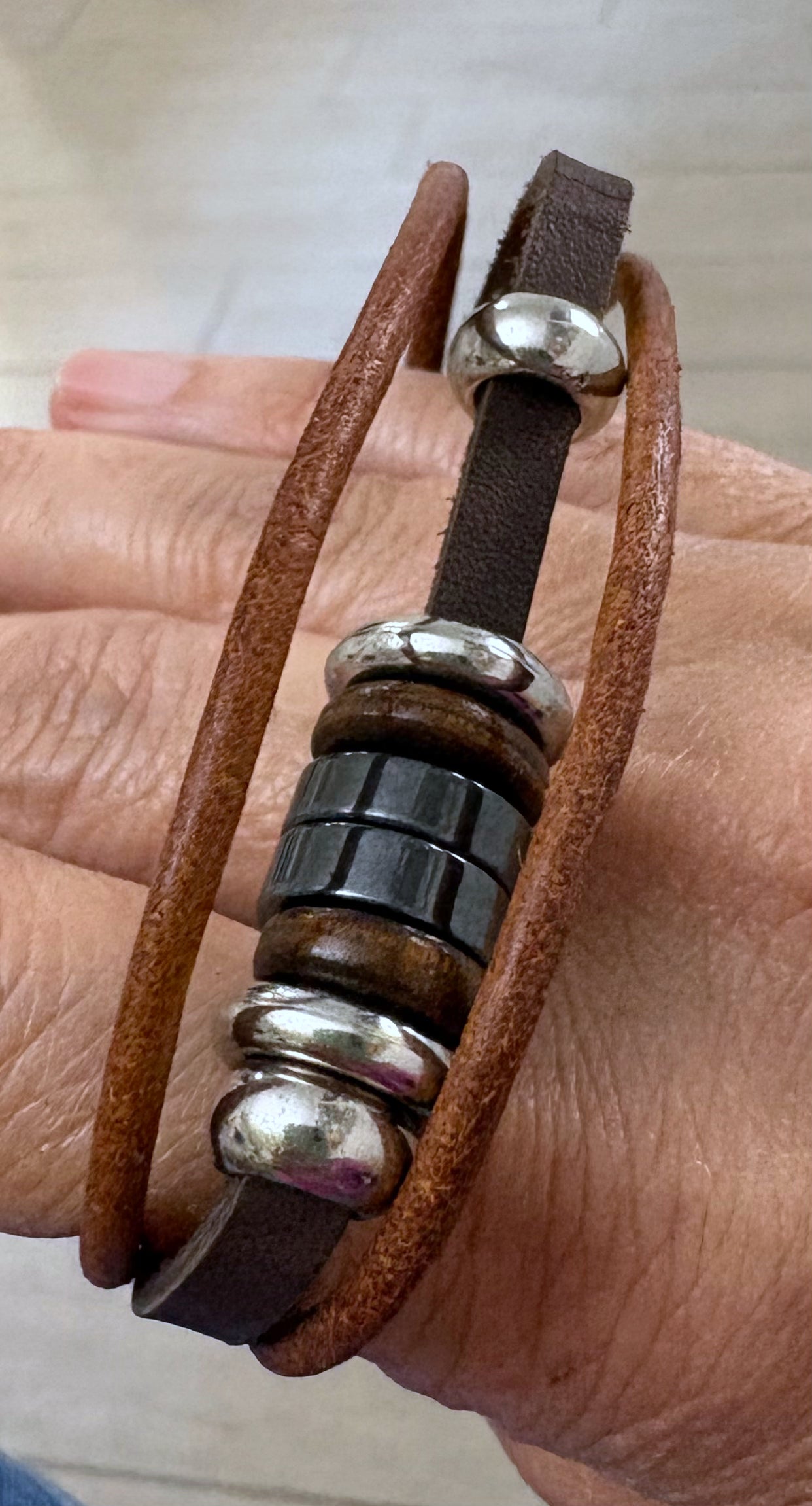 Three strand brown bracelet with beads