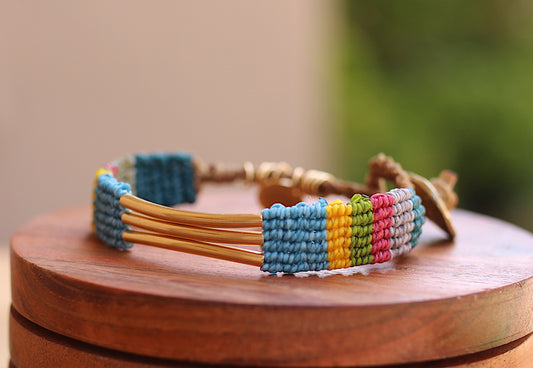 Multi color bracelet with braided tail