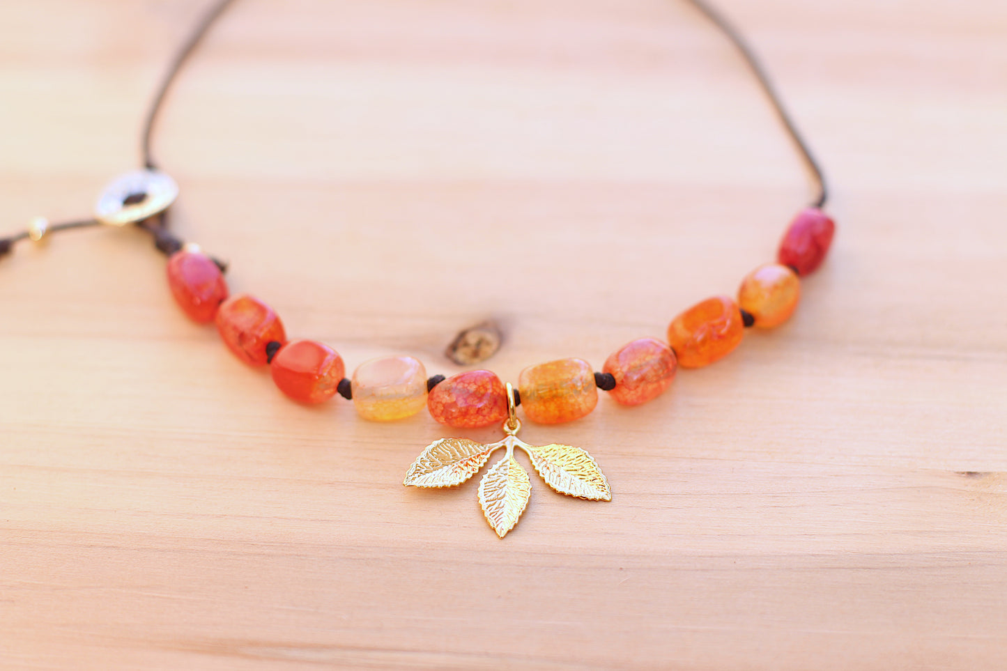 Orange gold leaf necklace