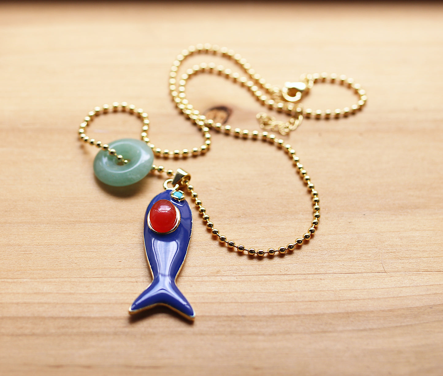 Ball chain necklace with a blue fish and jade