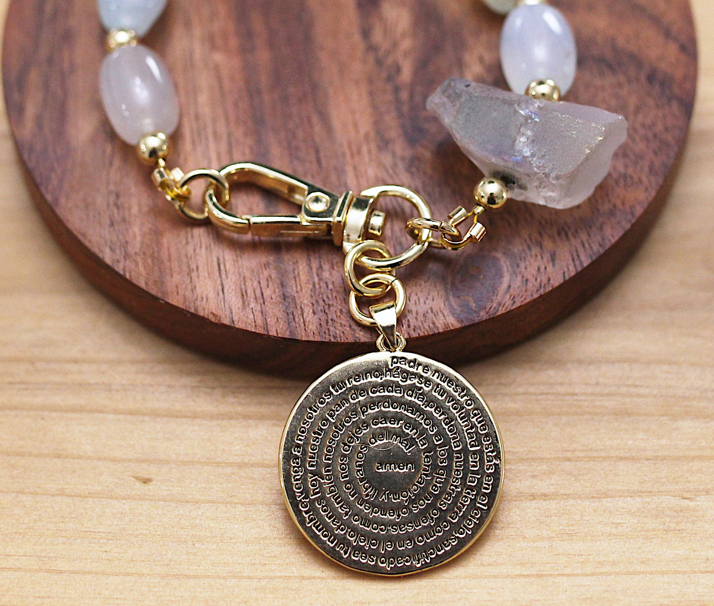 Gray and pale blue bracelet with Padre Nuestro round