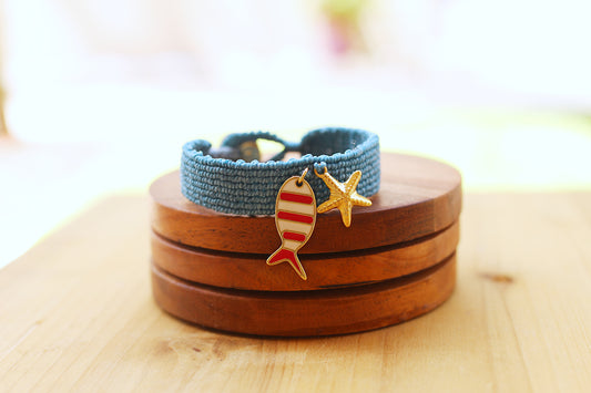 Blue Macramé bracelet with fish and star