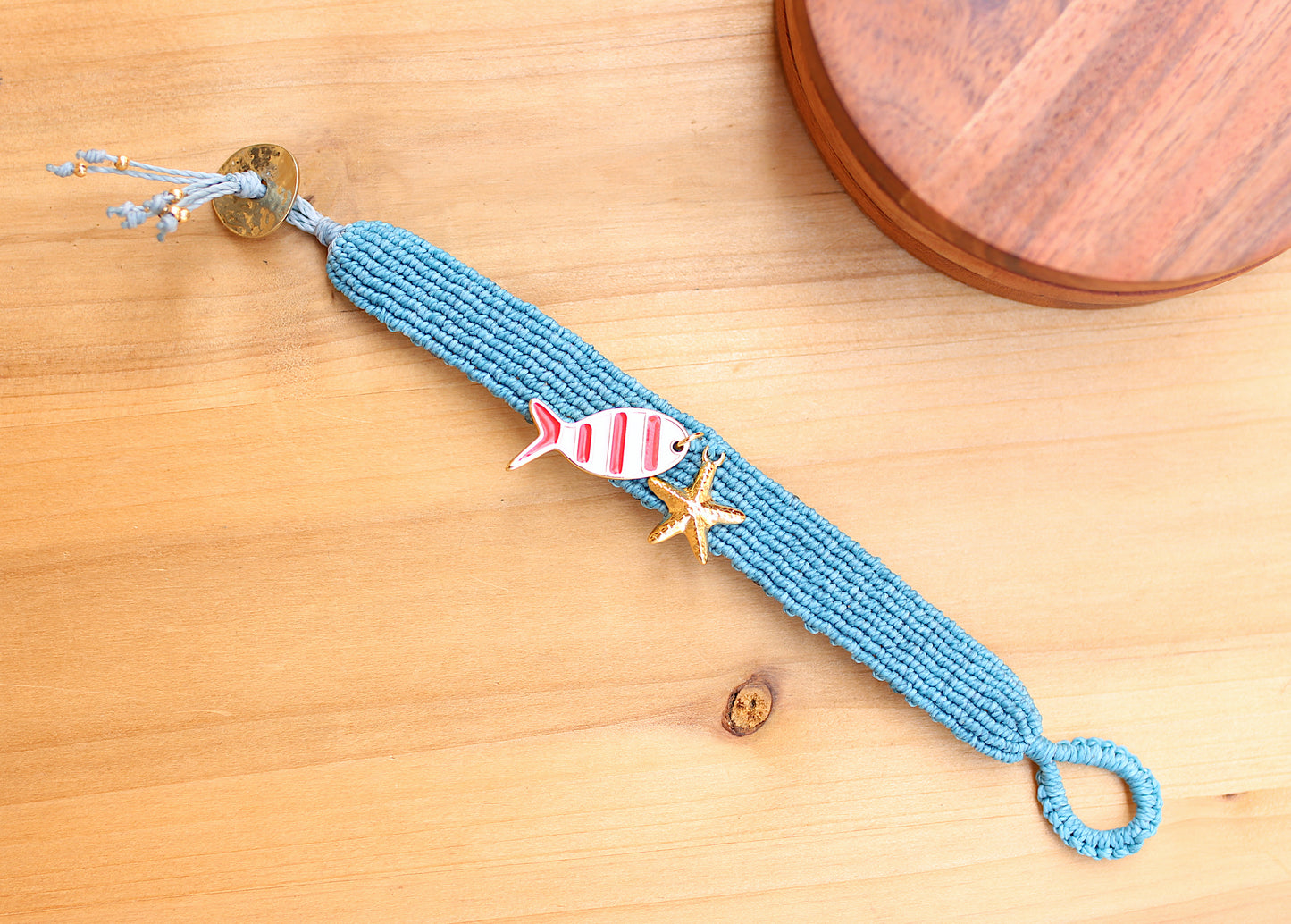 Blue Macramé bracelet with fish and star
