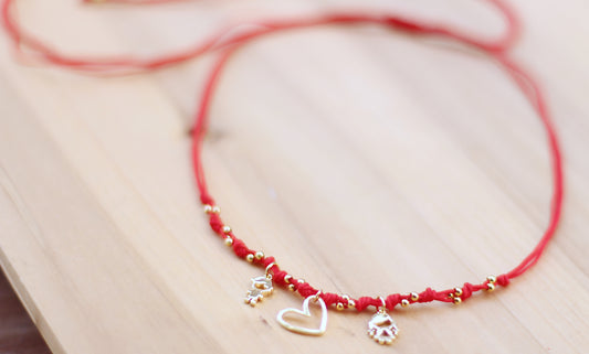 Red Necklace with children charm